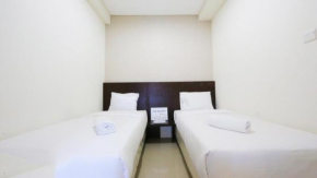 Clean and Cozy 2BR Apartment Parahyangan Residence By Travelio